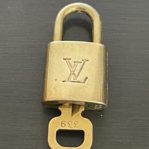 Cadeado especial Louis Vuitton Pinkerly e uma chave #339, latão