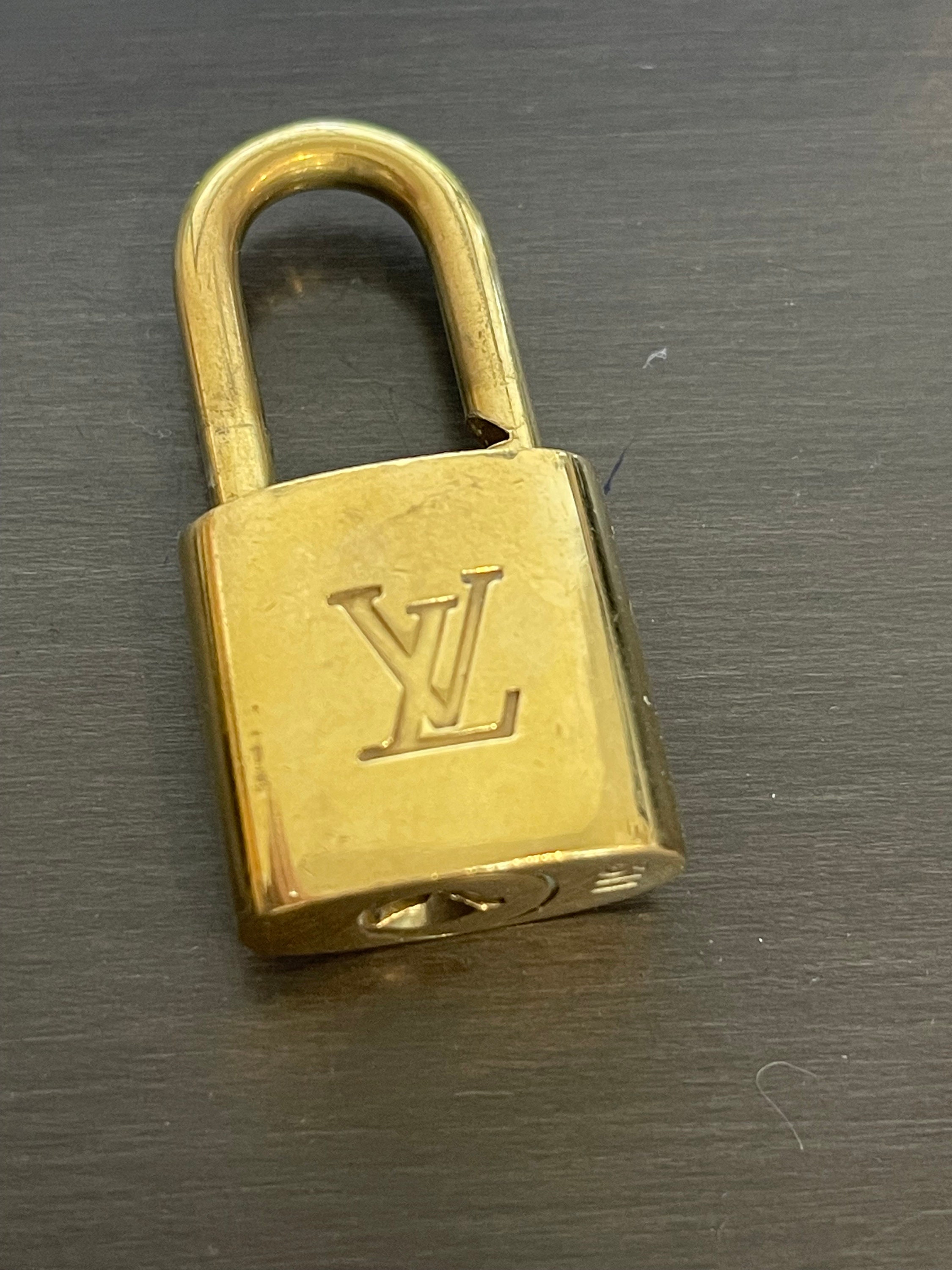 Louis Vuitton Lock Gold Tone No. 302