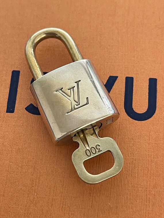 Louis Vuitton #300 Lock And Key Set Gold - $60 (88% Off Retail) - From  Alyssa