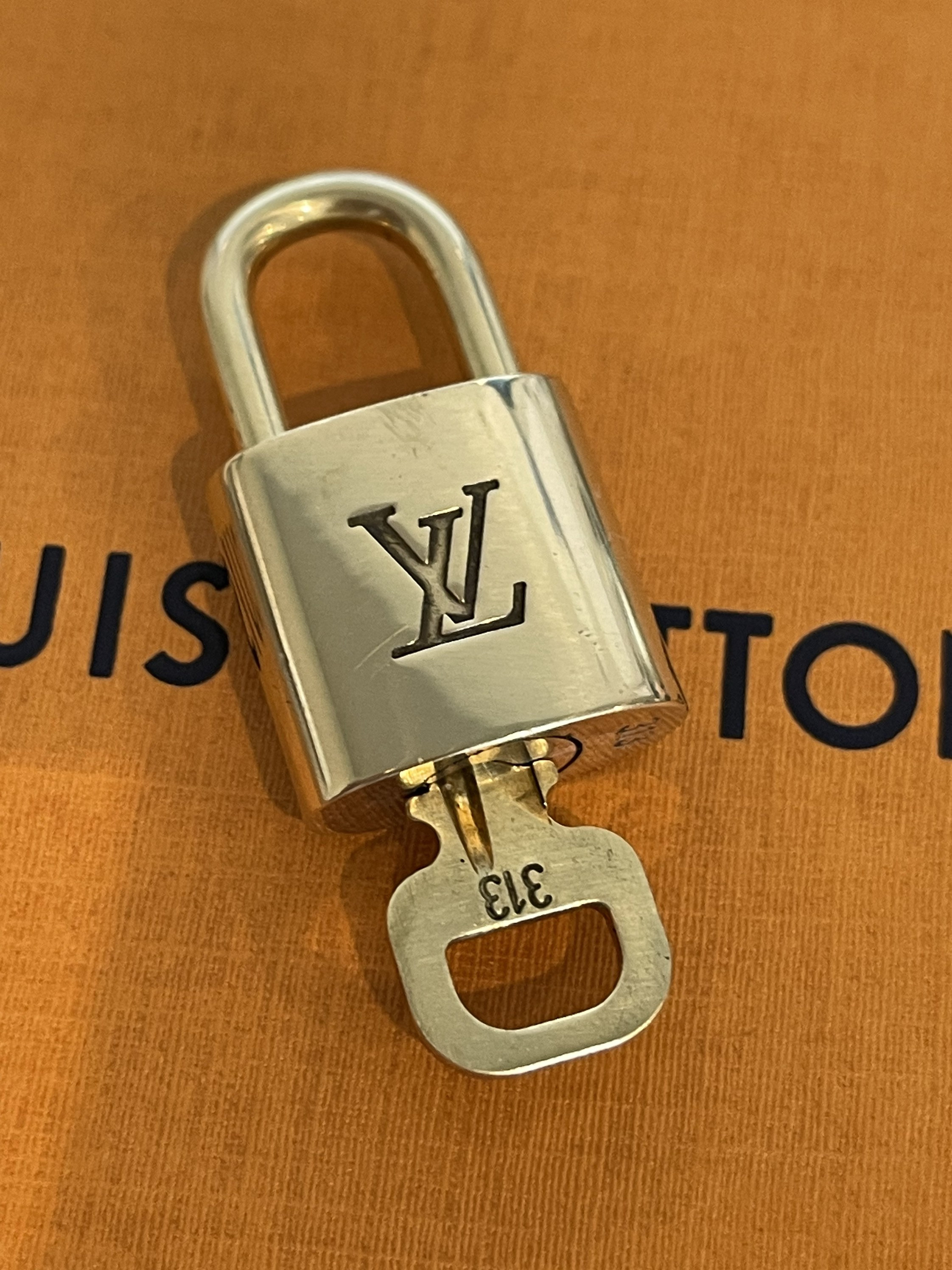 Louis Vuitton Lock Silver 