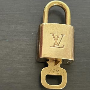 Cadeado especial Louis Vuitton Pinkerly e uma chave #337, latão