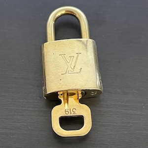 Cadeado especial Louis Vuitton Pinkerly e uma chave #319, latão