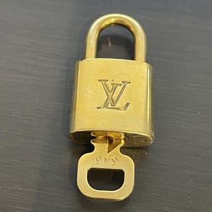 Cadeado especial Louis Vuitton Pinkerly e uma chave #343, latão
