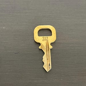 CHAVE Louis Vuitton Apenas uma chave #312 fechadura de latão