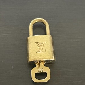 Cadeado Louis Vuitton e uma chave #307, fechadura de latão #11746