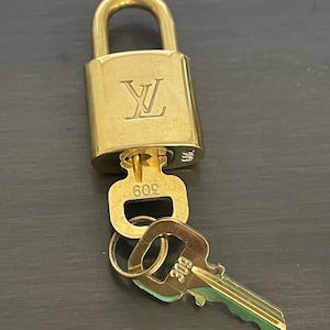 Cadeado Louis Vuitton e duas chaves sem polimento nº 309, latão nº 11723