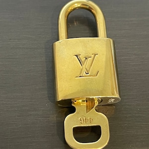 Cadeado especial Louis Vuitton Pinkerly e uma chave #446, latão