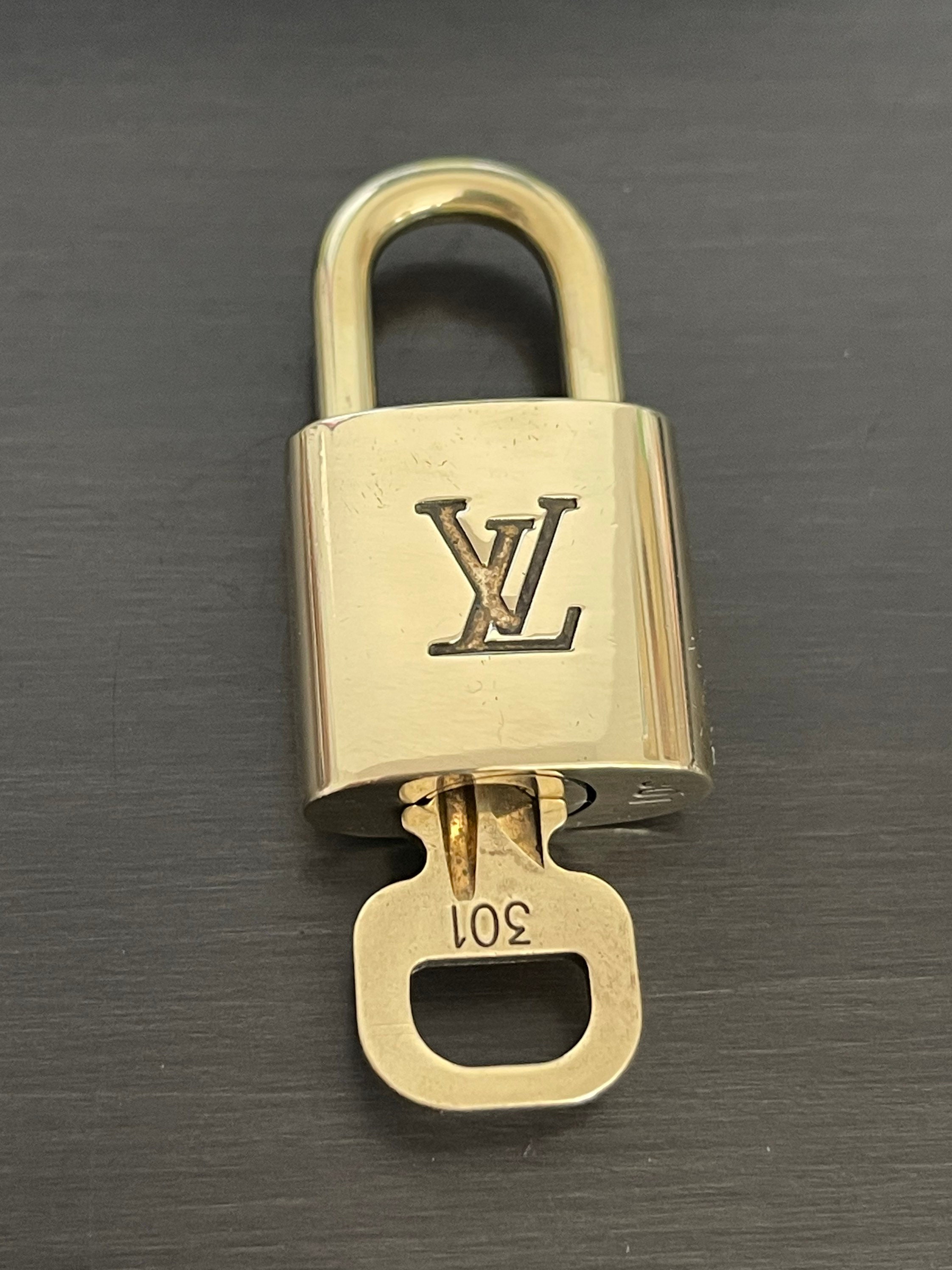 Louis Vuitton, Bags, Louis Vuitton Gold Brass Lock And Key 34