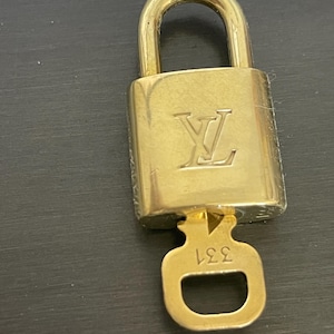 Cadeado especial Louis Vuitton Pinkerly e uma chave #331, latão