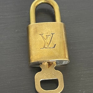 Repurposed vintage brass Louis Vuitton padlock 311 with layered style necklace  chains
