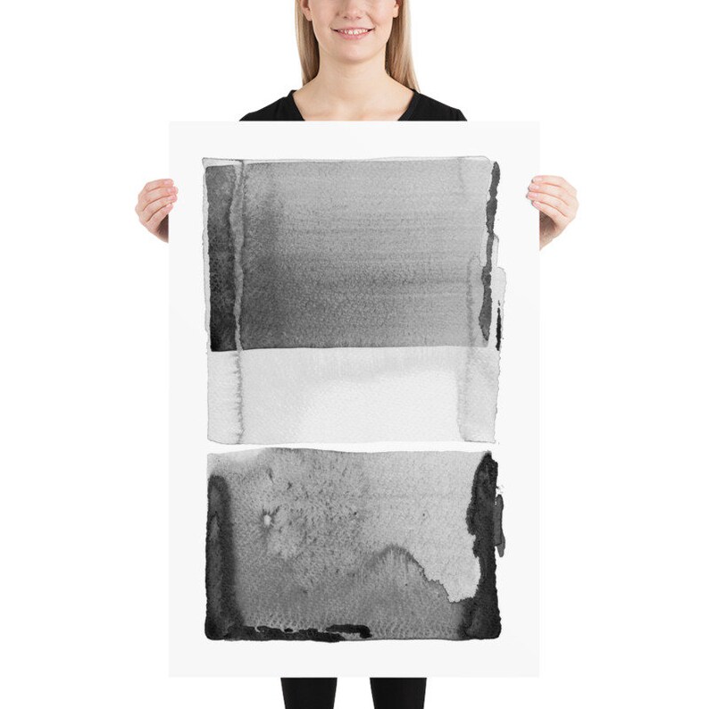 May include: A black and white abstract art print featuring three horizontal rectangular shapes. The top and bottom shapes are dark gray, while the middle shape is white. The artwork has a watercolor effect.