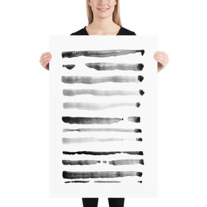 May include: A black and white abstract art print featuring horizontal brushstrokes. The strokes vary in width and intensity, creating a gradient effect from dark to light. The artwork is displayed on a white background.
