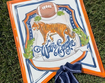 Tiger Crest Door Hanger, customize color and team. Size is 18”x24”.