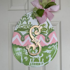 Pink and green Lilly preppy Easter egg  chinoiserie egg, with handpainted fun colorful details.