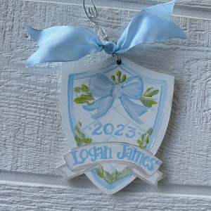 Baby blue crest personalized ornament 6”x5”