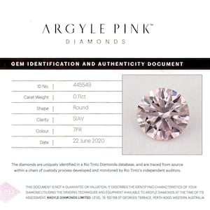 May include: A gem identification document for an Argyle Pink diamond. The document includes the ID number, carat weight (0.11ct), shape (round), clarity (SIAV), color (7PR), and date (June 22, 2020). A pink diamond is shown on the right.