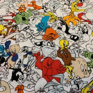 May include: A colorful fabric featuring a variety of cartoon characters, including Bugs Bunny, Daffy Duck, Tweety Bird, Sylvester the Cat, and Porky Pig. The fabric is white with black outlines and features a variety of colors, including red, yellow, blue, green, and orange.