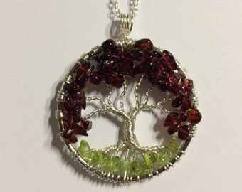 Tree Of Life Necklace Garnet Pendant with Peridot Roots on a Dark Brown Trunk. Includes  Sterling Silver Chain.