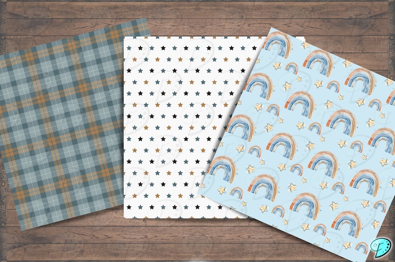 Op de afbeelding: Drie digitale papierpatronen met een blauw en bruin ruitpatroon, een witte achtergrond met zwarte en bruine sterren en een lichtblauwe achtergrond met regenboogbogen en gouden sterren.