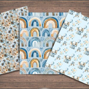 Op de afbeelding: Drie digitale papierontwerpen in blauw, bruin en wit. Het eerste ontwerp heeft een bloemenpatroon met kleine blauwe bloemen en bruine stelen. Het tweede ontwerp heeft een regenboogpatroon met blauwe, bruine en witte strepen. Het derde ontwerp heeft een patroon van olifanten die ballonnen vasthouden.