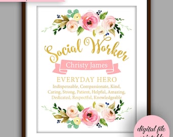 May include: Framed print with floral accents and the words "Social Worker" in gold script. A pink banner displays the name "Christy James" and the phrase "EVERYDAY HERO." Additional text lists positive attributes.