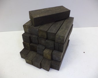 setje van 20 stuks ebben houten stukjes balkjes ebben hout