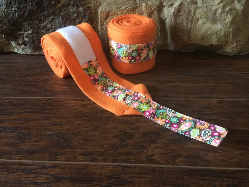 Orange Floral Ribbon Trimmed polo wraps