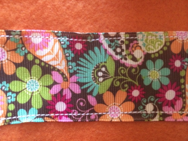 Orange Floral Ribbon Trimmed polo wraps