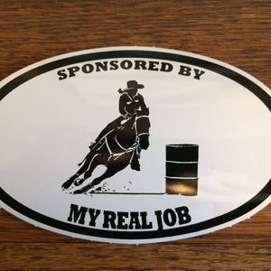 Sponsored by My Real Job Barrel Racer Decal – 5.25&quot; x 3.5&quot; – White Vinyl with Black Print – Perfect for Your Truck or Trailer