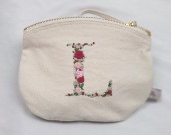 Cosmetic bag hand-embroidered with monogram