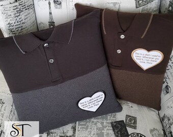 May include: Two brown and grey pillow covers shaped like a polo shirt with a heart-shaped patch on each. The patches have white text that reads "This is a shirt I used to wear. Whenever you hold it, I am there! Love, Pops" and "This is a shirt I used to wear. Whenever you hold it, I am there! Love, Hans".