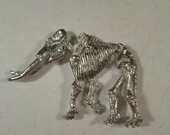 New...Mastodon Skeleton Pendant