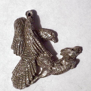 Goshawk hitting a Rabbit Pendent or Pin     New Design