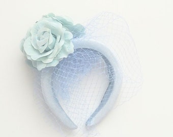 Blue Fascinator with Floral and Birdcage Veil Detail