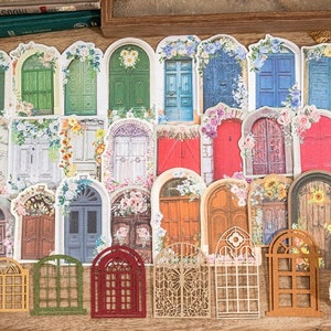 May include: A set of 20 decorative door stickers featuring various styles of doors with floral accents. The stickers are printed on white paper and have a matte finish.