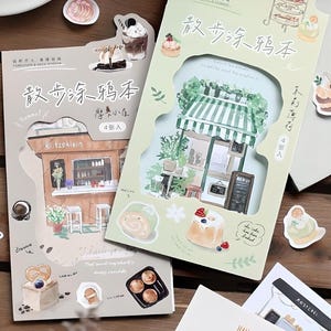 1 st, linnen papieren stickers. 4 vellen. Cafés, restaurants, winkels. Tekeningen.