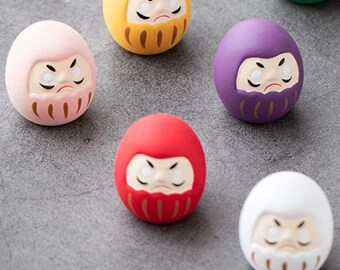 Daruma doll. Without eyes. No eyes. To paint. Make a wish
