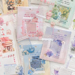 20 autocollants transparents en PET. Des cadres avec des paragraphes sur les fleurs, les bonbons et les fruits. Dentelle