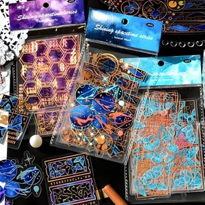 10 naklejek PET. Złoto, folia laserowa. Meduzy. Ptaki. Gołębie. Wzór geometryczny. Deco