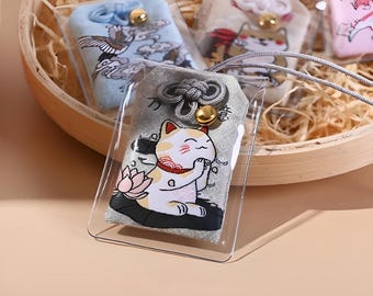 Adorable cat omamori. Japanese amulet. Shinto. Buddhist. Maneki neko. Lucky cat. Shiba inu. Sakura. Cherry blossom. Carp. Koi fish.