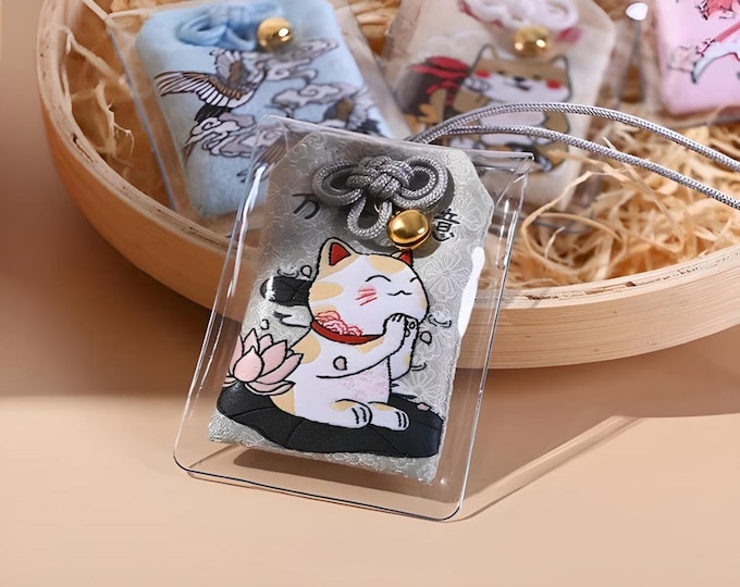 Adorable cat omamori. Japanese amulet. Shinto. Buddhist. Maneki neko. Lucky cat. Shiba inu. Sakura. Cherry blossom. Carp. Koi fish.