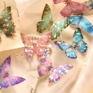20 Stück, facettierte, folierte, PET Schmetterlingssticker. Kristall Schmetterlinge. Schmuck.