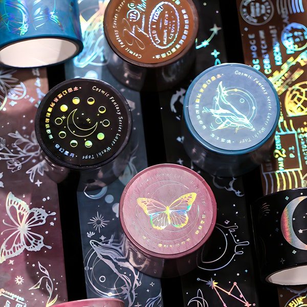 Silver foil. Washi tape. Moon phases, stars. Butterflies. Fantasy, whales. Postage