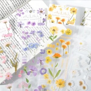 1 tira de pegatinas PET sin cortar. Flores violetas. Flores rosas. Flores amarillas. Flores blancas. Margarita. Violeta. Pensamiento. Flor de cerezo