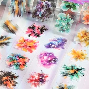 Stickers roll. PET material, matte.  Splashes of colors. Cosmos. Clouds. Nebula. Universe. Abstract