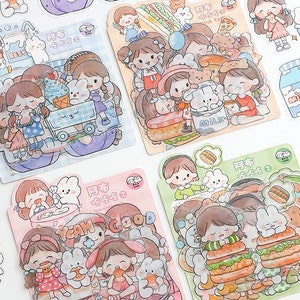 27, kawaii, cartoon, meisje en konijn, stickers. Eten feest. Papierwaren. Planner