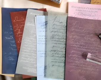 May include: A collection of vintage paper sheets with handwritten text in white ink on a variety of colored backgrounds, including blue, gray, red, and purple. The text is faded and worn, giving the papers a vintage look. The text includes the words "HOUSHOLD FURNITURE" and "Societis".