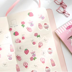 40 clear, mini stickers with cartoon bear and strawberry drinks.