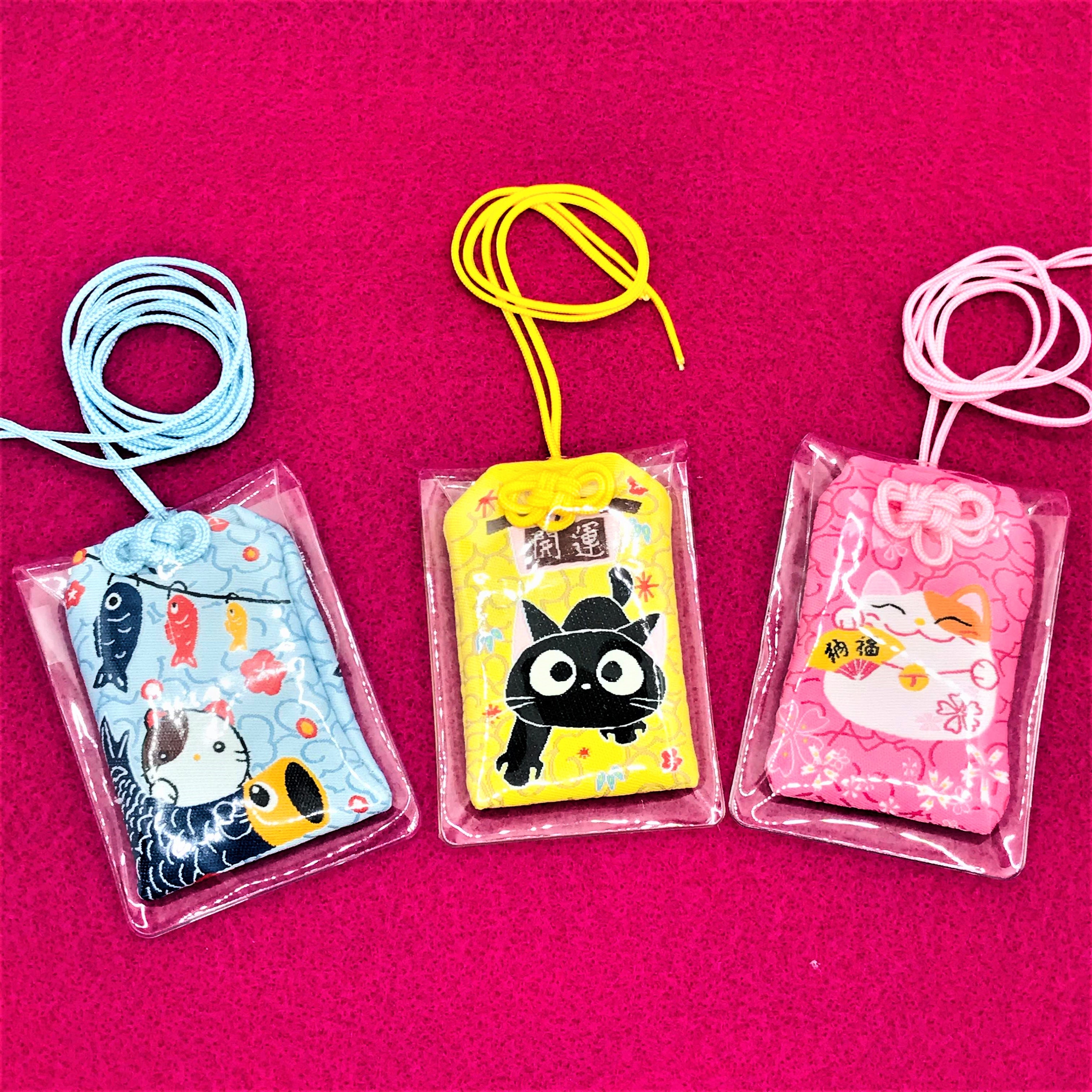 7 designs. Adorable cat omamori. Japanese amulet. Shinto. Buddhist. Maneki neko. Lucky cat. Koinobori. PAnda bear. Dumpling. Rabbit