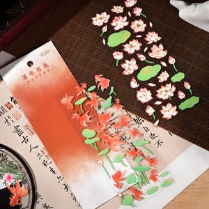2 vellen, ongesneden, Aziatisch, Chinees, Japans, PET-stickers. Vos. Panda. Bamboe. Feniks. Lotusbloem. Waterlelie. Kranen. Sakura.